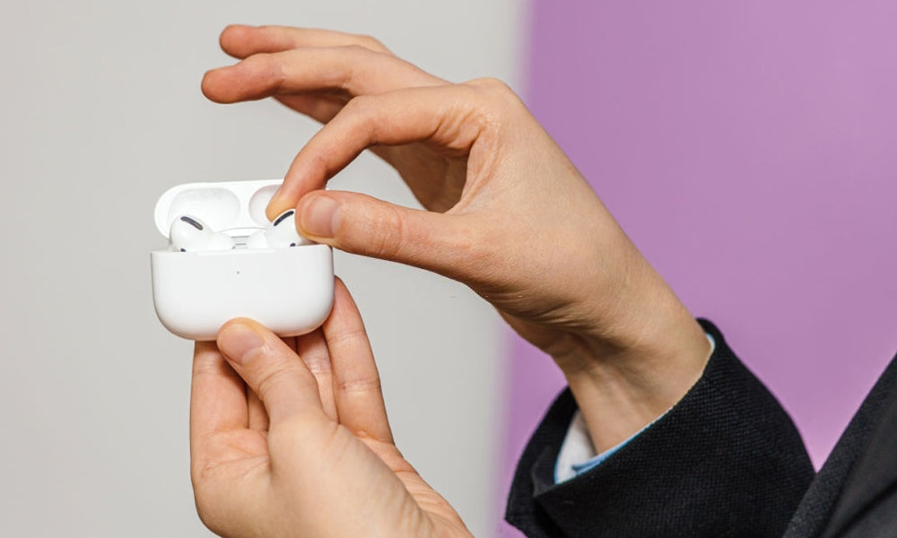 how to take AirPods out of case